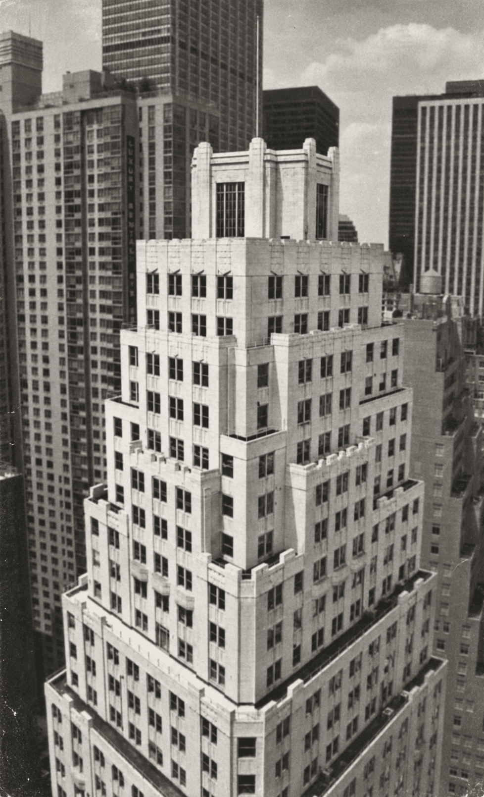 Sepia-toned photograph of 116 John Street in New York City, showing the Art Deco setbacks of Nester Finn Financial District